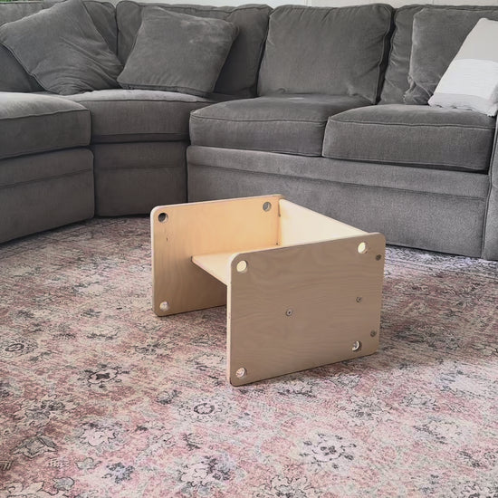 Wooden toddler chair that flips into adult stool or side table 